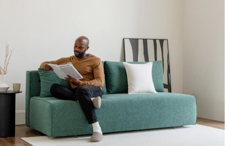 Timeless Ease Found in a Green Sofa Bed